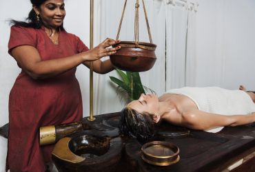 Ayurvedic Spa therapy using herbal products